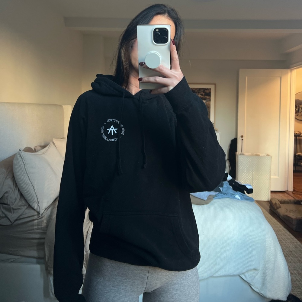 Pelotons Alex Toussaint “Do Better” hoodie